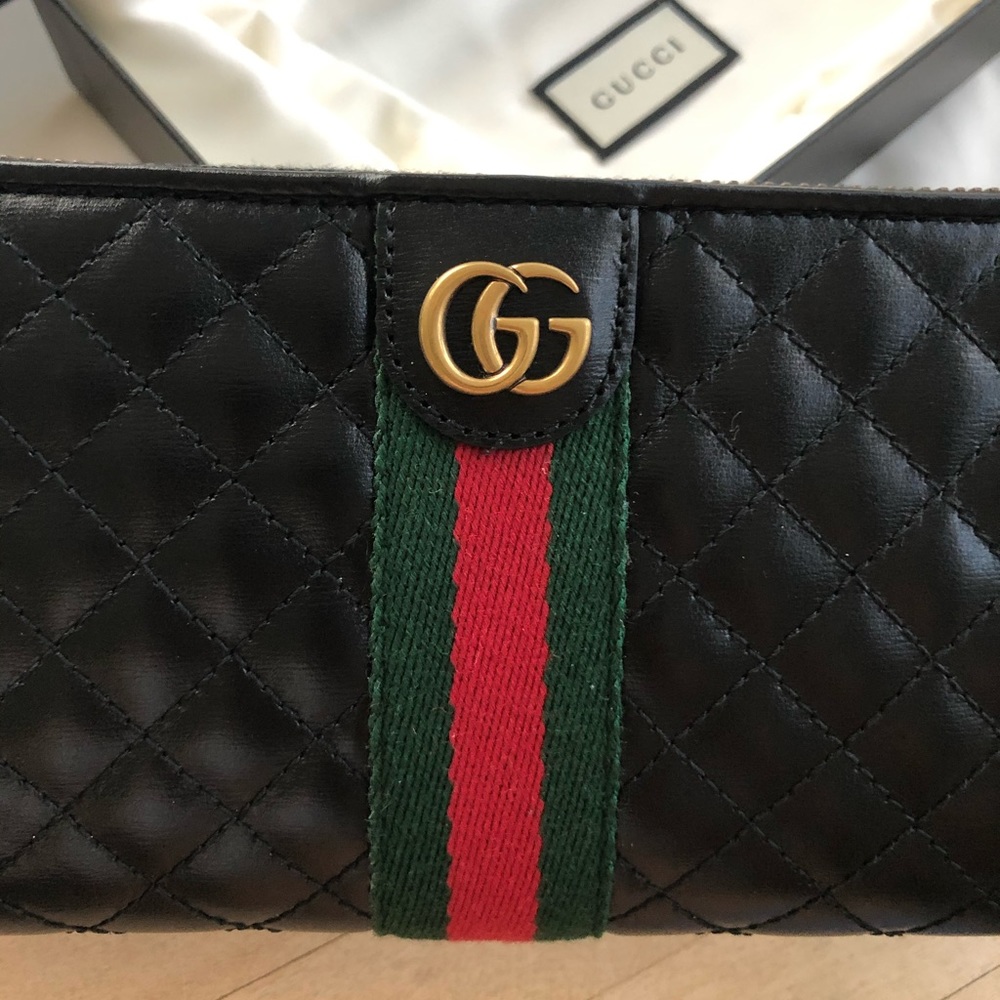 Brand new black Gucci wallet